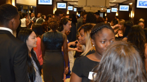 Students mingling at corporate event