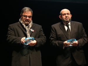 Namee Barakat, father of Deah Bakarat, and Mohammad Abu-Salha, father of Yusor Mohammad, accept the Unsung Hero Award on behalf of their children during the annual Martin Luther King Jr. Celebration.