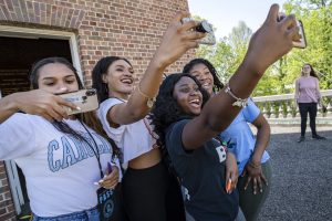 Seniors take a selfie after climbing the Bell Tower on the campus of UNC Chapel Hill.